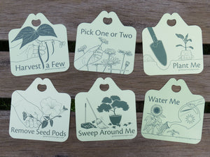 Illustrated plant tags that invite hands-on gardening. Includes: harvest a few, pick one or two, plant me, remove seed pods, sweep around me, and water me. For horticultural therapy and school gardens